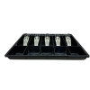 Front angled view of a black plastic IBM Toshiba point-of-sale cash register till insert tray, showcasing a low-profile perspective of the five front coin compartments and five rear bill slots equipped with light grey metal hold-down clips, isolated on a white background.