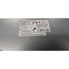 Top view close-up of the manufacturer label on a silver power supply casing, clearly identifying the model as PWR-C1-1100WAC V02 with a total output of 1100W, along with various regulatory certification logos.