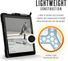 An infographic showcasing a Microsoft Surface Go tablet in a black Urban Armor Gear (UAG) Metropolis case. Bold text at the top reads "LIGHTWEIGHT CONSTRUCTION" followed by a description explaining how a web of hollow cells minimizes weight while providing strength. A circular inset diagram highlights the "Feather-Light Honeycomb Design" internal structure.