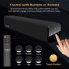 Infographic demonstrating the dual control options for the Bestisan soundbar. A hand is shown interacting with the side touch-control interface, which features volume, power, and input selection buttons. On the left, a remote control points to circular diagrams showing how the front LED indicator changes color for Coaxial (green), Bluetooth (blue), Optical (white), AUX (yellow), USB (purple), and Standby (red) modes.