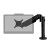 A desk-mounted black articulating arm supporting a faint, semi-transparent horizontal monitor screen, showing the arm connected to a vertical pole mount base against a white backdrop.