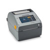 Three-quarter front view angled to the right of the Zebra ZD621d thermal printer, emphasizing the front media output slot for linerless labels, the Zebra logo branding, and the prominent color LCD interface screen.