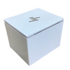 Three-quarter isometric view of the compact, white cubic HP mini thermal receipt printer, highlighting its sleek matte finish, seamless joints, and the modern HP logo embossed on the flat top cover.