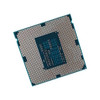 Underside view of an Intel LGA 1150 processor showing the dense grid arrangement of gold-plated land contact pads on a dark green substrate, surrounding a central rectangular section filled with surface-mounted electronic capacitors and resistors.