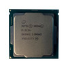 Direct front-facing view of the Intel Xeon E-2124 server processor, featuring a square silver metallic integrated heat spreader (IHS) laser-etched with the Intel logo, Xeon brand name, model E-2124, sSpec code SR3WQ 3.30GHZ, and manufacturing batch serialization code X921G173.