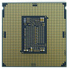 Symmetrical overhead view of the underside of an Intel LGA 1151 server processor, showcasing a dense, multi-directional grid pattern of gold contact pads on a green substrate, surrounding a vertical rectangular center array tightly packed with small electronic capacitors, resistors, and a tiny "001" identifier text string.