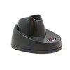A side perspective view from a lower angle of the black Honeywell presentation charging base, highlighting the sloped design of the outer plastic shell, the hollow inner opening of the docking slot, and the integrated scanner paging button on the front lip.