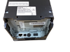 An inverted view of a black Epson TM-m30 thermal receipt printer, model M335A. The image displays the underside connection panel, which features an Ethernet port, a USB Type-B port, and a circular power connector, alongside the device's main compliance label, a serial number sticker, and additional manufacturing assembly information.
