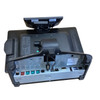 Underside view of the NCR CX7 POS terminal head showing the input/output connectivity panel, including colored teal and red PoweredUSB ports, standard USB, serial, LAN, and display interfaces.