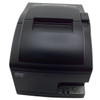 Top-down front view of the Star Micronics SP700 dot matrix printer, showing the paper exit slot, the cover release latch button, and the brand logo on the lower left corner.