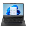 The dark gray Lenovo Yoga 9i 2-in-1 laptop is shown from the front in a conventional laptop configuration, open on a white surface. The display shows the Windows 11 desktop with the Start menu and taskbar visible. The full QWERTY keyboard and trackpad are also shown.