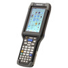 An angled front-right perspective of the Honeywell CK75 mobile computer, set against a plain white background. This view highlights the depth and industrial, two-tone construction (gray frame with dark gray bumpers). The full alphanumeric keypad is visible, showing the shift of the balance toward the handle. The touchscreen is brightly lit, displaying an array of pre-installed circular Android app icons.