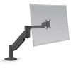 Side-angle view of the black HAT Design Works 7500 monitor arm extended fully forward, supporting a semi-transparent wide curved display mock-up attached to its VESA mounting plate.