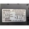 Close-up view of the product specification label on the bottom of the BIXOLON printer displaying model SRP-350PLUSIII, NCR part number 497-0508382, power ratings, and regulatory certifications.