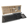 Angled perspective shot of an iron gray Toshiba POS keyboard in the foreground next to its clear plastic modular keycap organizer and molded pulp packaging tray in the background.