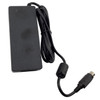 Top perspective view of a plain black rectangular AC power adapter brick with its attached black DC output cable, inline ferrite core, and round 4-pin power connector tip.