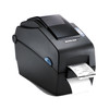 Side-angle view of a black Bixolon SLP-DX220 direct thermal desktop label printer dispensing a printed barcode receipt label.