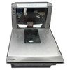 Front angled view of Datalogic PSC Magellan 8502 medium length in-counter bi-optic barcode scanner and scale with stainless steel platter and vertical bonnet.