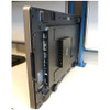 Rear angle view of an Elo interactive display showing port access, ECM computer module slot, and mounted hardware on the Elo E275050 bracket system.