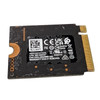 Rear view of Micron 2550 512GB M.2 2230 NVMe SSD showing regulatory compliance label, black PCB, and gold PCIe connector pins