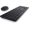 Low-angle profile view of the slim Dell Pro KM5221W keyboard showing low-profile chiclet keys with the wireless optical mouse positioned behind it.