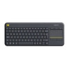 Flat top-down view of the Logitech K400 Plus wireless touch keyboard, showing the complete key layout, function row icons, integrated touchpad, and Logitech branding.