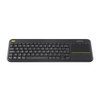 Top-down front view of the Logitech K400 Plus wireless touch keyboard, highlighting the full keycap arrangement, media control buttons, and large mouse touchpad with yellow accent line.