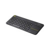 Angled view of the Logitech K400 Plus wireless touch keyboard in black, showcasing its compact QWERTY layout, integrated right-side touchpad, and distinct yellow accents.