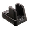 Angled three-quarter view of the Datalogic Skorpio X5 single charging cradle, highlighting its compact desktop design, device slot, and status indicator light.