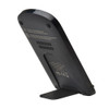 Angled rear perspective of the charging stand extended on its kickstand, showing the power specifications and input port.