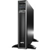 The APC Smart-UPS X 1500VA standing vertically on a white background supported by two black stabilizing feet, highlighting its convertible tower orientation.