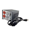 Rear panel of the AMETEK Powervar line conditioner featuring two orange AC output receptacles, protective knockout covers, ventilation slots, and the connected power cable.