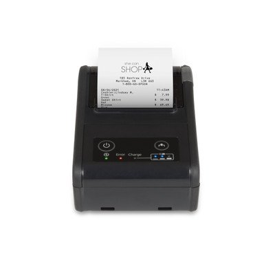 A top-down view of a compact, black Epson TM-P60II mobile receipt printer against a white background. A printed receipt for a shop named "she can SHOP" emerges from the top slot, displaying itemized costs and a date from 2021. The front control panel features a power button, a paper feed button, and LED status indicators for power, error, charge, and battery level.