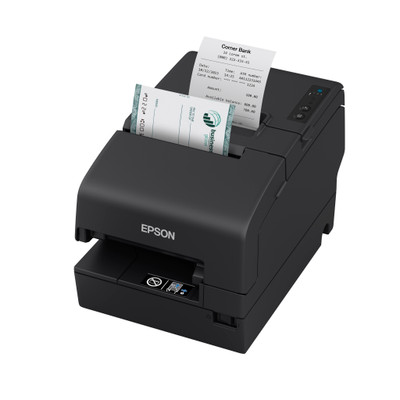 A high-angle studio shot of a black Epson TM-H6000VI multifunction POS printer on a white background.

The device is processing two items simultaneously: a printed receipt emerges from the top-right slot, and a bank check is being fed or scanned through the front-left slot. The printer has a matte black finish with the "EPSON" logo in silver on the front. A small control panel with status lights and buttons is visible on the top-right surface.

The receipt from "Corner Bank" displays transaction details, including an amount of 100.00 and an available balance. The bank check features a green teal logo and a "global business" watermark.
