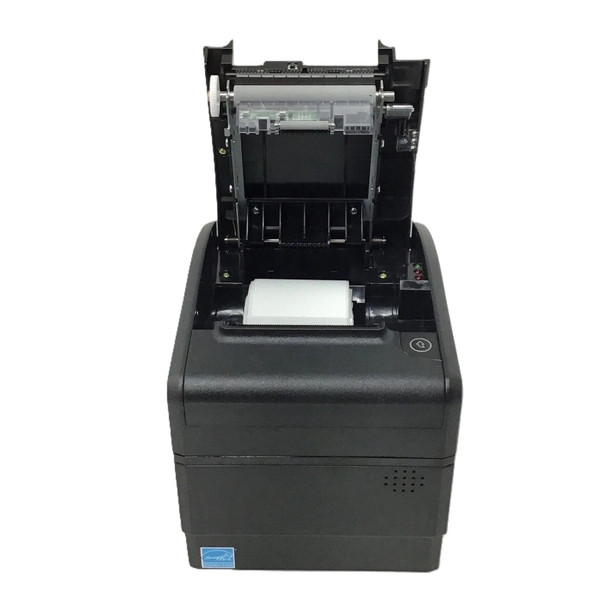 Front view of a black Bixolon SRP-S300 linerless thermal printer with its top cover flipped completely open, revealing the internal mechanics and the paper roller assembly. A clean, white roll of thermal paper is sitting ready inside the paper reservoir stall, and an Energy Star badge is affixed to the lower-left corner.