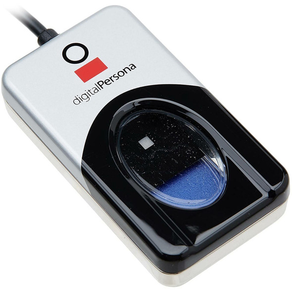 A close-up, high-angle view of a DigitalPersona 4500 optical USB fingerprint reader. The device has a rectangular body with a silver top and a black glossy finish around the scanning area. The "digitalPersona" logo, featuring a red square and a black circle, is printed on the silver section. The scanning surface is a central oval-shaped glass window with a dark blue tint. A black USB cable is visible extending from the top of the reader.