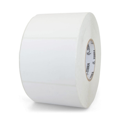 A side angle shot of a single roll of Zebra 10000284 Z-Perform 2000T blank white 4x3 thermal transfer labels, showing the wide label face and a 3-inch cardboard core cleanly printed with the repetitive black Zebra logo on the inside, isolated on a white background.