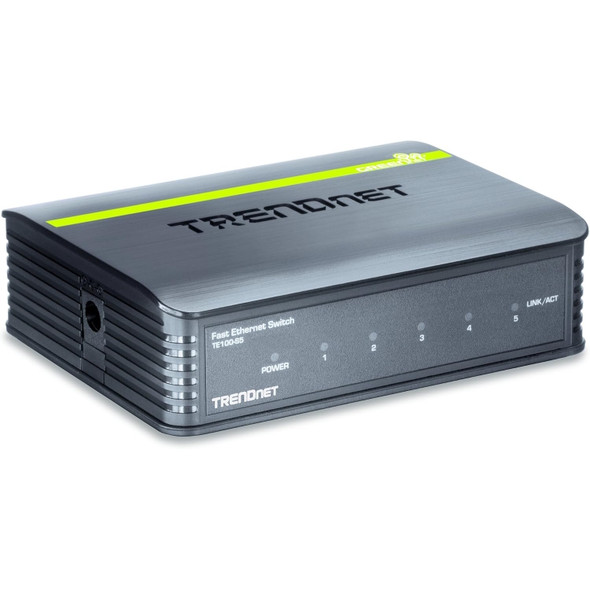 A side-angle perspective of the grey plastic TRENDnet TE100-S5 5-port switch, displaying the ribbed side ventilation and the round barrel-type DC power input port on the left-hand panel, viewed alongside the front-facing LED indicator array and the distinct bright green stripe running across the upper rear edge.