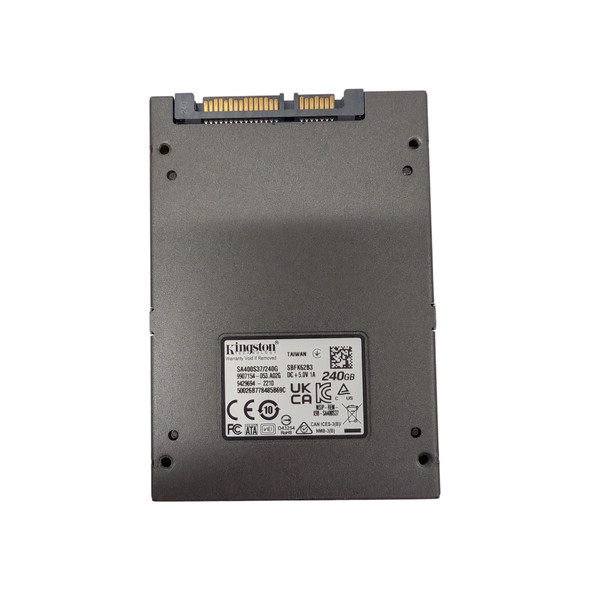 A detailed top-down view showing the back specifications label of a dark grey Kingston A400 solid-state drive against a plain white background. The white rectangular label provides comprehensive data, including the bold "Kingston Technology" logo, capacity "240GB", model "SA400S37/240G", and several regulatory compliance symbols including UKCA, CE, FC, and Serial ATA. At the top of the drive, the gold-slotted SATA data and power connector interface is clearly visible and exposed.
