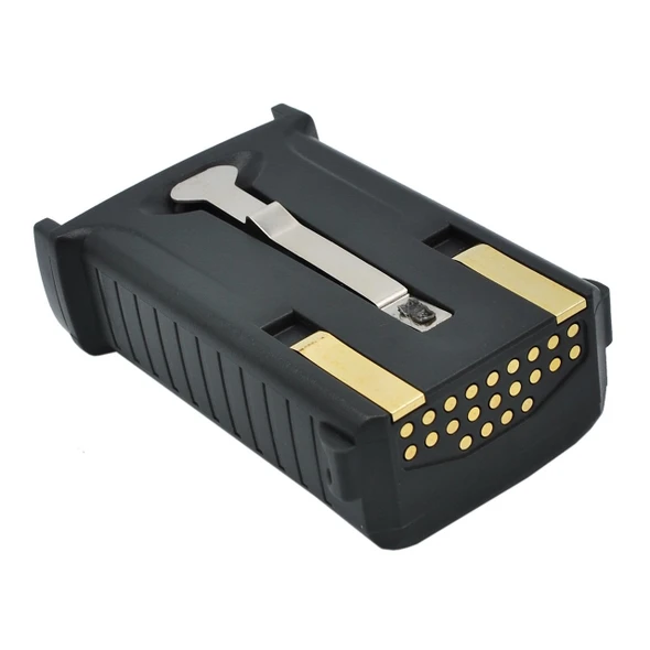 A three-quarter view looking down at the bottom interface of a dark gray rugged replacement battery pack. A long, T-shaped metal grounding or retention clip runs down the center of the matte plastic casing, flanked by two elongated gold metal contact pads. An angled grid pattern of sixteen circular gold charging pins is clustered on the front-facing end of the unit.
