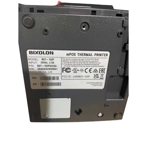 Alt Text: Close-up of the specification and manufacturing label located on the bottom of a Bixolon mPOS thermal printer. The label displays Model: BGT-102P, P/N: BGT-102PG/USA, and S/N: USAEIKA23020041, alongside certification logos including FCC, UL, CE, EAC, and UKCA.