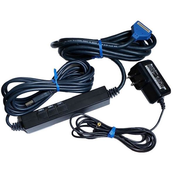 A Verifone 23741-02-R multi-lane terminal cable bundle organized against a white background. The set includes a coiled black data cable featuring a distinct blue BERG connector head, a long secondary cable ending in a standard USB Type-A plug, an inline black rectangular junction hub marked with "COM 1," "COM 2," and "COM 3" port slots, and an accompanying black wall-plug AC power adapter with its own bundled barrel jack cord.