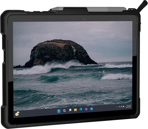 A clean, front-facing view of a Microsoft Surface Go tablet enclosed in a heavy-duty, black UAG protective case. A stylus pen is securely docked along the top edge, and the tablet screen displays a Windows 11 desktop with a coastal rock and ocean wave wallpaper.