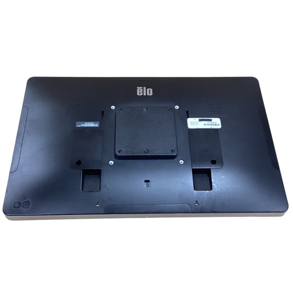 Full rear view of the black Elo I-Series 3.0 all-in-one terminal, highlighting the central square VESA mount block, dual symmetrical speaker grilles near the top, the silver Elo logo, and two small circular hardware control buttons on the lower-left edge.