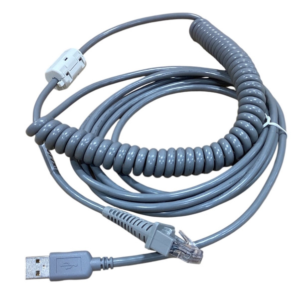 A close-up view of the gray Datalogic 90A052066 interface cable, showing a coiled section, a standard USB Type-A male connector, an RJ45 modular plug with modular strain relief, and a white ferrite core plastic clip.