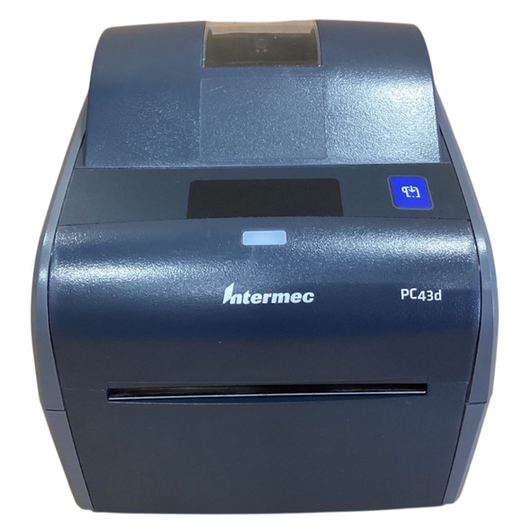 Front angle of the navy blue Honeywell PC43d direct thermal printer, highlighting the Intermec branding, the model name "PC43d," a blue feed button on the top right, a status LED indicator, and the front slot where labels exit.