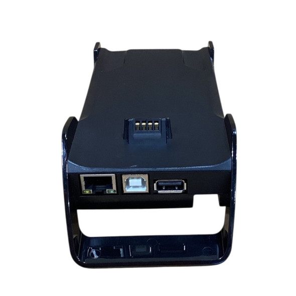 Rear port view of a black Ingenico Move 5000 charging base showing an Ethernet jack, USB-B port, standard USB-A port, and top golden charging pins.