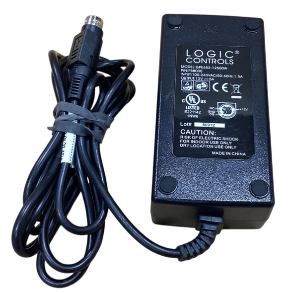 Close-up top view of the Logic Controls PB8000 power supply adapter, showing the full specification label with model number GPE652-12500W, 12V 5A output, safety logos, and attached cable bundle with a 4-pin connector.