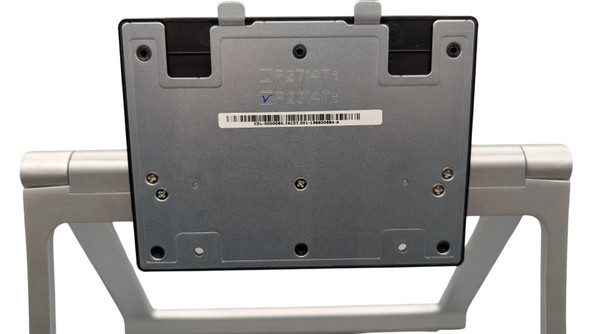 Close-up view of the metal quick-release mounting bracket on the Dell touchscreen stand, showing stamped P2314T model markings and a serial number barcode label.