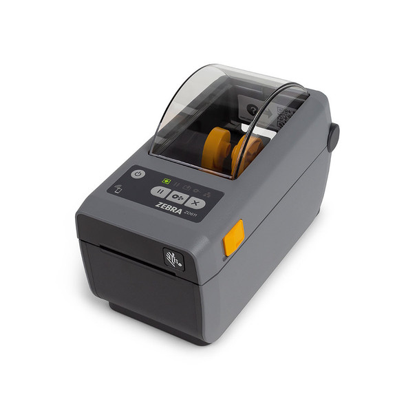 Zebra ZD611d desktop label printer angled left view displaying side yellow release latch, LED status panel, and compact grey enclosure.